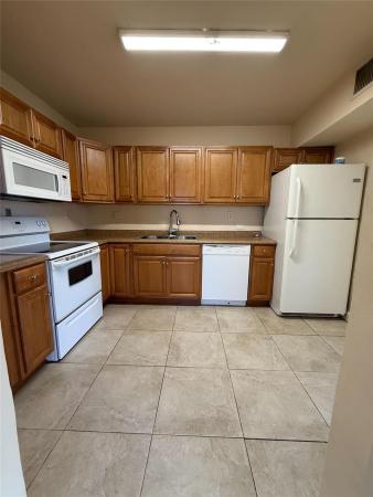 Sun Tan Village, 621 E 13th St, Hialeah, Florida 33010, image 2