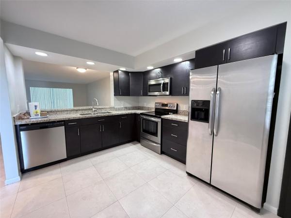 Cambridge At Century Village, 1201 SW 128th Ter #104 E, Pembroke Pines, Florida 33027, image 1