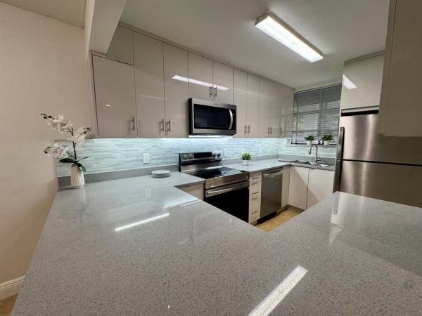 Villas At Meadow Lakes, 1256 S Military Trl #915, Deerfield Beach, Florida 33442, image 1