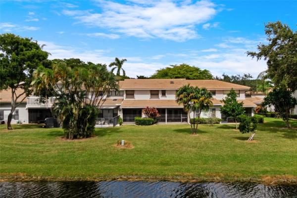 The Townhomes Of Deer Creek, 3260 Deer Creek Lake Shore Dr, Deerfield Beach, Florida 33442, image 1