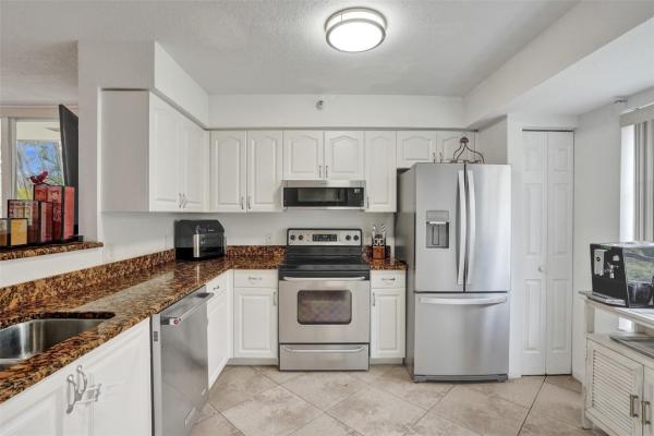 The Yacht Club On The Intracoastal, 127 Yacht Club Way #112, Hypoluxo, Florida 33462, image 1