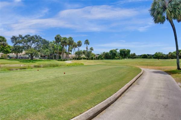 The Palms Of Deer Creek, 2410 Deer Creek Country Club Blvd #202-E, Deerfield Beach, Florida 33442, image 1