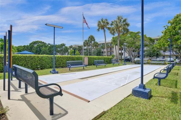The Palms Of Deer Creek, 2410 Deer Creek Country Club Blvd #202-E, Deerfield Beach, Florida 33442, image 2