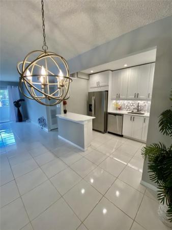 Entrada, 21 Jacaranda Country Club Dr #124, Plantation, Florida 33324, image 1