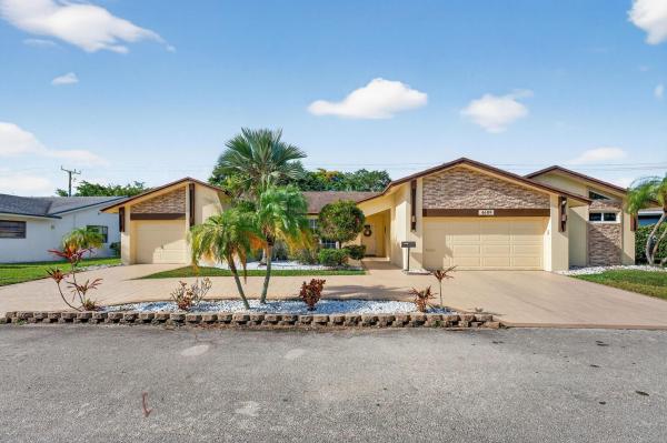 The Woodlands, 4609 Norfolk Island Pine Dr, Tamarac, Florida 33319, image 1
