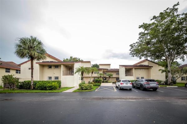 Holly Court At Woodmont, 8760 Holly Ct #104, Tamarac, Florida 33321, image 1