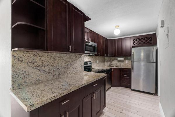 Manor Grove Village, 124 NE 19th Ct #106B, Wilton Manors, Florida 33305, image 1