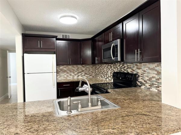 Lakes Of Jacaranda, 10741 Cleary Blvd #102, Plantation, Florida 33324, image 1