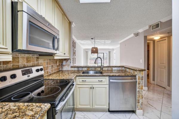 Water Chase At Cypress Bend, 2230 N Cypress Bend Dr #108, Pompano Beach, Florida 33069, image 1