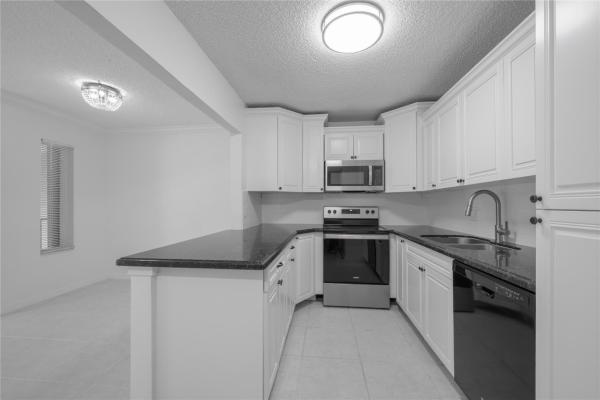 Pine Ridge North 3, 711 Sunny Pine Way #B2, Greenacres, Florida 33415, image 2