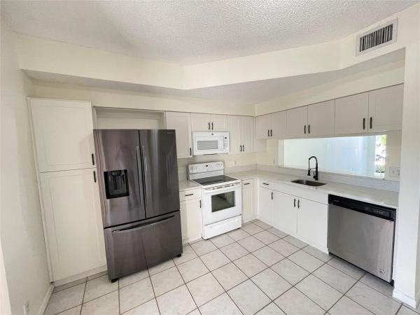 Coral Reef Club, 9844 NW 56th Pl, Coral Springs, Florida 33076, image 1