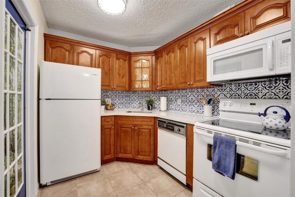 Manor Grove Village, 1920 NE 1st Ter #109H, Wilton Manors, Florida 33305, image 1