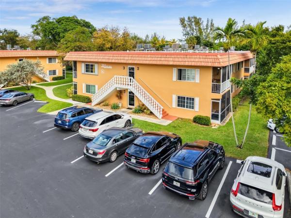 Manor Grove Village, 351 NE 19th Pl #203K, Wilton Manors, Florida 33305, image 1