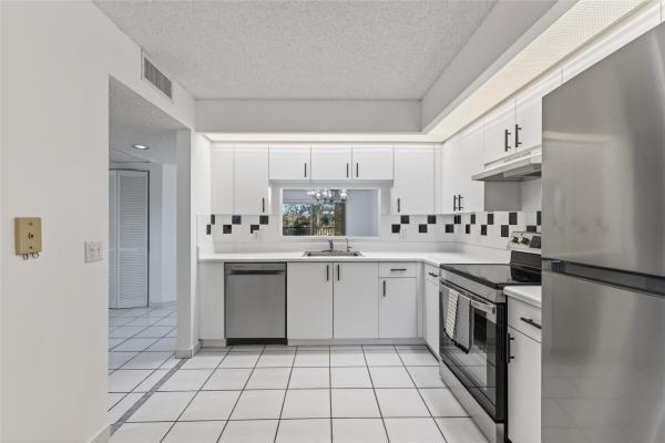 Suffolk At Century Village, 900 SW 142nd Ave #213L, Pembroke Pines, Florida 33027, image 2