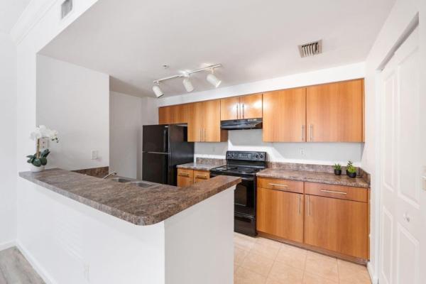 Poinciana Place, 5800 W Sample Rd #102, Lake Worth, Florida 33067, image 2