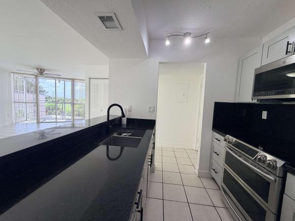 Las Brisas Country Club Of Miami, 7035 NW 186th St #D508, Country Club, Florida 33015, image 3