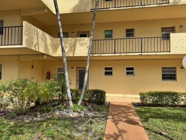 Cambridge House Of Carriage Hills, 351 Cambridge Rd #104, Hollywood, Florida 33024, image 3