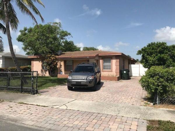 Whispering Palms, 1409 S H St, Lake Worth Beach, Florida 33460, image 1