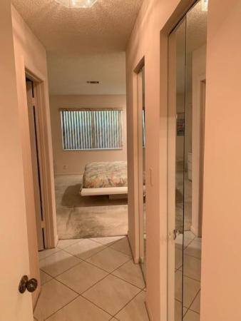 Poinciana Place Townhomes, 6991 Clover Ct, Lake Worth, Florida 33467, image 1