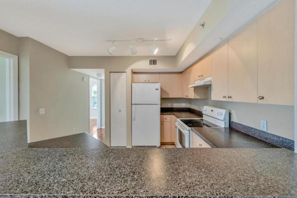 Emerald Isle At Laguna Lakes, 4101 San Marino Blvd #301, West Palm Beach, Florida 33409, image 1