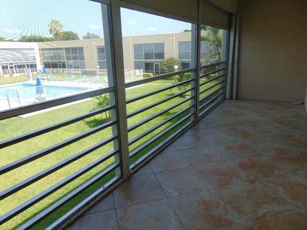 Poinciana Gardens At Poinciana Place, 3212 Strawflower Way #201, Lake Worth, Florida 33467, image 1
