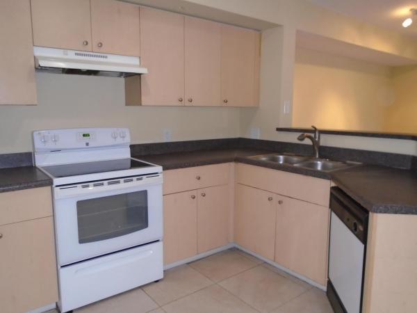 Emerald Isle At Laguna Lakes, 4211 San Marino Blvd #101, West Palm Beach, Florida 33409, image 1