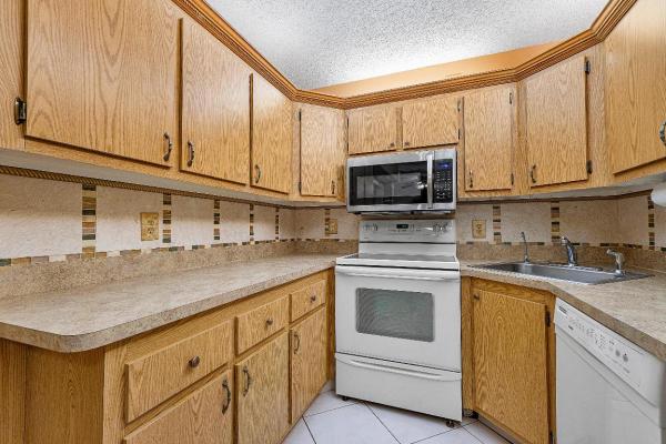 Pine Ridge North 4, 820 Sky Pine Way #A1, Greenacres, Florida 33415, image 1