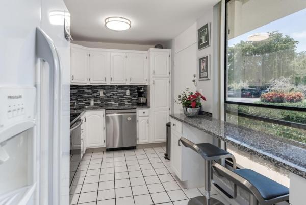 Garden Court Villas, 2520 Presidential Way #102, West Palm Beach, Florida 33401, image 1