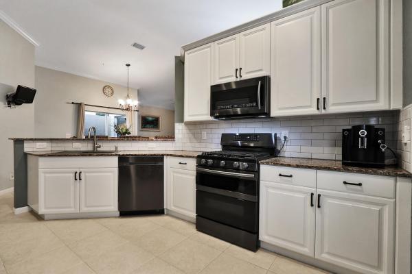 Thoroughbred Lake Estates, 5941 Asturian Trl, Lake Worth, Florida 33449, image 1
