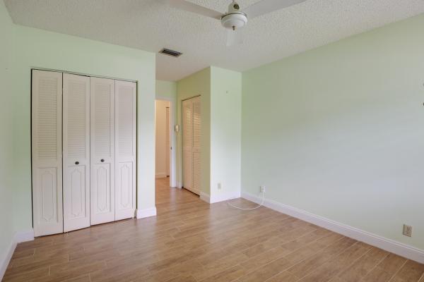 Poinciana Place Townhomes, 6994 Peony Pl, Lake Worth, Florida 33467, image 1