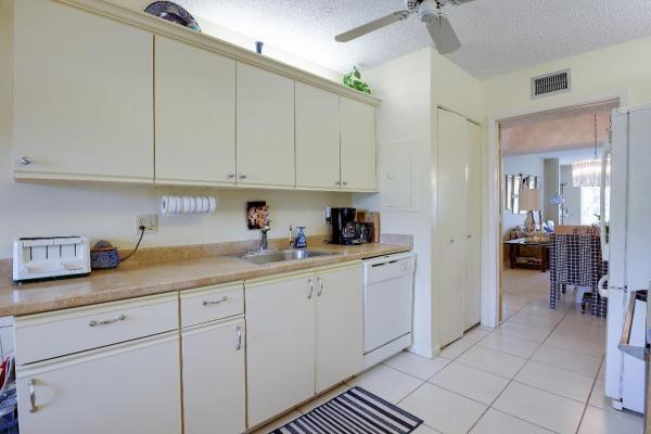 Gramercy At Poinciana Place, 6768 10th Ave N #113, Lake Worth, Florida 33467, image 1