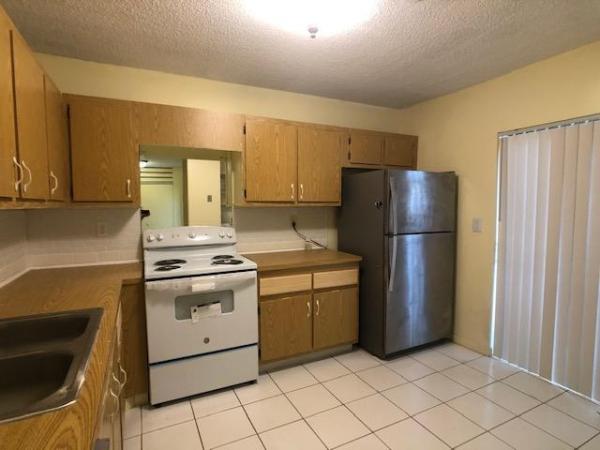 Indian Trail Villas, 119 Conaskonk Cir, Royal Palm Beach, Florida 33411, image 1