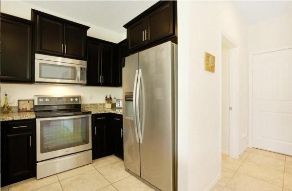 Emerald Cove, 831 Palm Tree Ln, Haverhill, Florida 33415, image 2