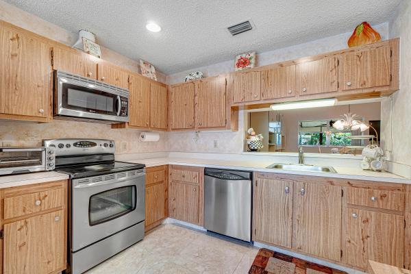 Poinciana Place Townhomes, 6998 Peony Pl, Lake Worth, Florida 33467, image 1