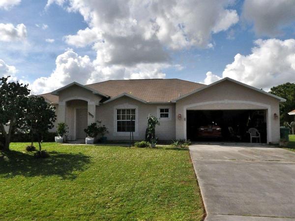 3892 SW Janiga St, Port St. Lucie, Florida 34953, image 1