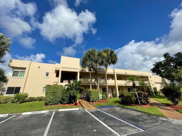 Poinciana Gardens At Poinciana Place, 3212 Strawflower Way #103, Lake Worth, Florida 33467, image 1