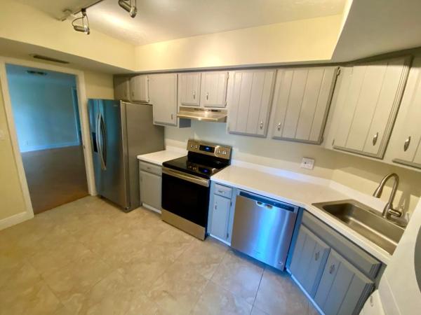 Garden Court Villas, 1705 Presidential Way #B102, West Palm Beach, Florida 33401, image 2