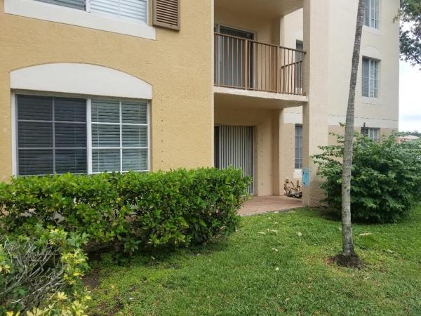 Emerald Isle At Laguna Lakes, 4240 San Marino Blvd #107, West Palm Beach, Florida 33409, image 1