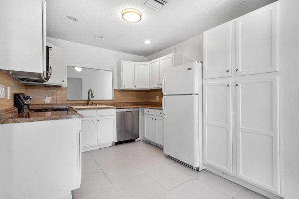 Lucerne Homes East, 6285 Summer Sky Ln, Greenacres, Florida 33463, image 1