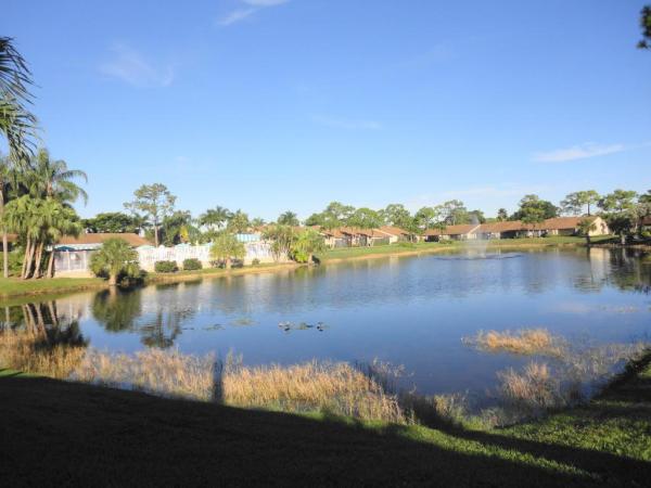 Pine Ridge North 3, 702 Sunny Pine Way #B2, Greenacres, Florida 33415, image 1