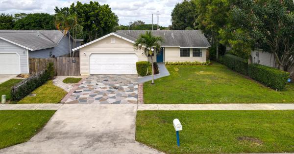 The Forest Homes, 5035 El Claro Cir, West Palm Beach, Florida 33415, image 1