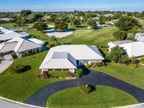 French Royale Villas, 395 Villa Dr S, Atlantis, Florida 33462, image 1