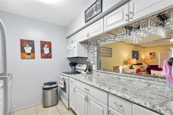 Greenway Village South, 12005 Poinciana Blvd #106, Royal Palm Beach, Florida 33411, image 1