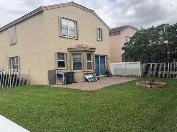 Thoroughbred Lake Estates, 10408 Olde Clydesdale Cir, Lake Worth, Florida 33449, image 1