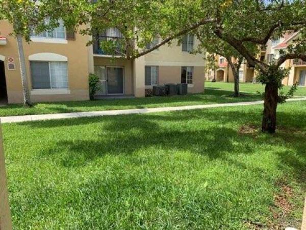 Emerald Isle At Laguna Lakes, 4115 San Marino Blvd #102, West Palm Beach, Florida 33409, image 1