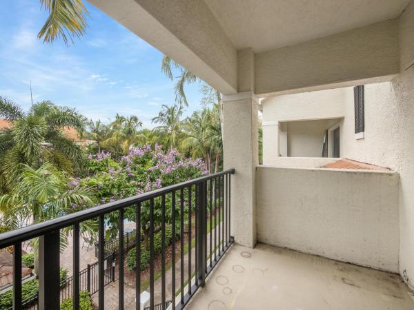 Poinciana Place, 5840 W Sample Rd #305, Lake Worth, Florida 33067, image 1