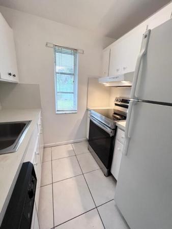 Greenway Village North, 133 West Ct, Royal Palm Beach, Florida 33411, image 1