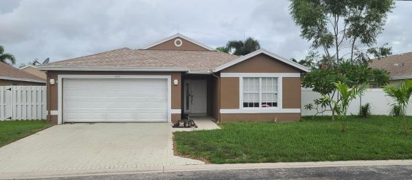 The Enclave, 1633 Crooked Stick Way, Greenacres, Florida 33413, image 1