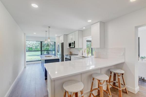 Trader's Crossing North At Jonathan's Landing, 16622 Traders Xing N #102, Jupiter, Florida 33477, image 1
