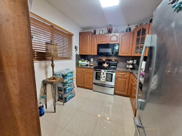 Country Lane, 17000 NW 67th Ave #231, Country Club, Florida 33015, image 3
